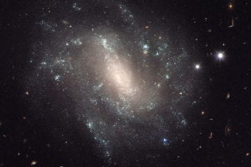 Faintest Early-Universe Galaxy Ever, Detected and Confirmed